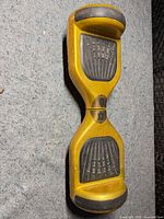Top view of gold hoverboard showing foot pads and overall finish