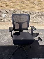 Front view of black mesh Office Star task chair