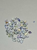 Overhead view of mixed-cut tanzanite parcel