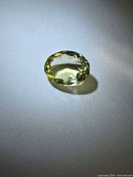Top view of oval faceted yellow citrine