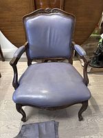 Front view of purple leather Bergere armchair