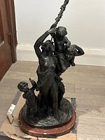 Front view of bronze sculpture on marble base