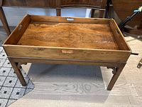 Full view of tray table on stand showing overall design