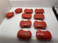 Overhead view of all ten crab dishes displayed on countertop