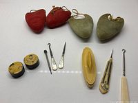 Group shot of all items including shoe inserts, vials, tools and nail buffer