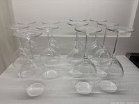 Group of upside-down wine glasses showing quantity and clarity