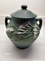 Front view of Roseville Freesia lidded pot