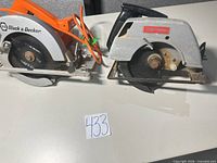 Both circular saws side by side showing complete condition