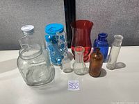 Group shot of all nine vessels arranged on tabletop