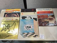 All ten LPs arranged on table showing front sleeves