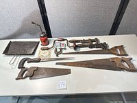 All items laid out on table showing overall lot contents