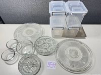 Group view of all glass dishes, bowls and four plastic storage containers
