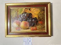 Front view of framed still life painting