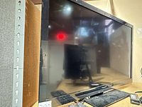 Front angled view of Panasonic television on stand