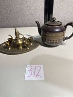 full lot showing brass set on tray and teapot