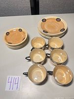 overview of all six teacups, six saucers and four salad plates