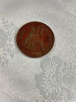 Full view of coin obverse showing Britannia and date