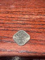 Reverse view showing hibiscus design, denomination and date 1969