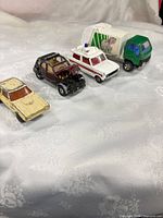 Four die-cast vehicles side by side