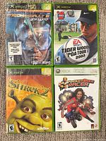Front covers of four original Xbox game cases