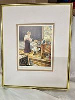 Full view of framed print with mat and gold frame