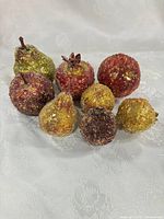 Group shot of all eight glittered fruit decorations