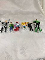 Group shot of all six action figures lined up