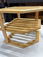 Full view two-tier bamboo corner shelf