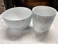 Bowl and tumbler side-by-side showing exterior finish and interiors