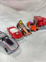 Five cars lined up showing overall lot