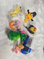 Group of seven assorted small toys