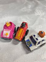 All three mini vehicles front angled view