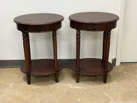 Full view of both oval side tables front