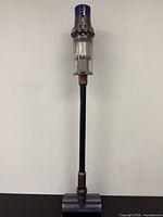 Full view of Dyson V10 cordless stick vacuum assembled