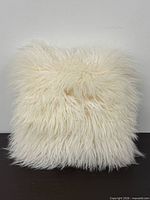 Front view of faux sheepskin pillow