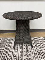 Full view of resin wicker end table