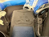 Close-up of fin size M 6.5-9.5 with snorkels and goggles visible