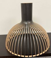 Front view of Secto Design bentwood pendant shade