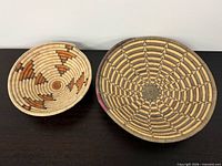 Both woven baskets side by side