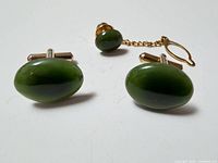 Full view pair jade cufflinks and tie tack