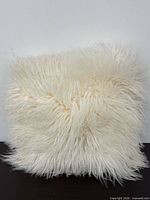 Front view of white Mongolian lamb sheepskin pillow