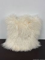 Front view of white Mongolian lamb wool pillow