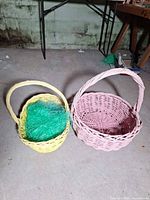 Pink and yellow wicker baskets side by side