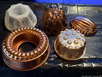 Group shot of all five molds showing variety of shapes and materials