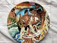Front of HawaiianaWare decorative plate showing Hawaiian beach scene