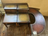 Overhead view showing two side tables and U-shaped coffee table