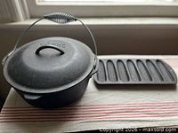 Dutch oven and cornbread mold together