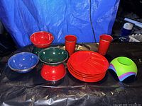 Group shot of bowls, tumblers, plates and sand cup holders