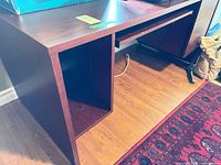 Overall view of cherry laminate computer desk with keyboard tray and open compartment