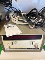 Front and top view of HP 5381A counter with coiled BNC cables